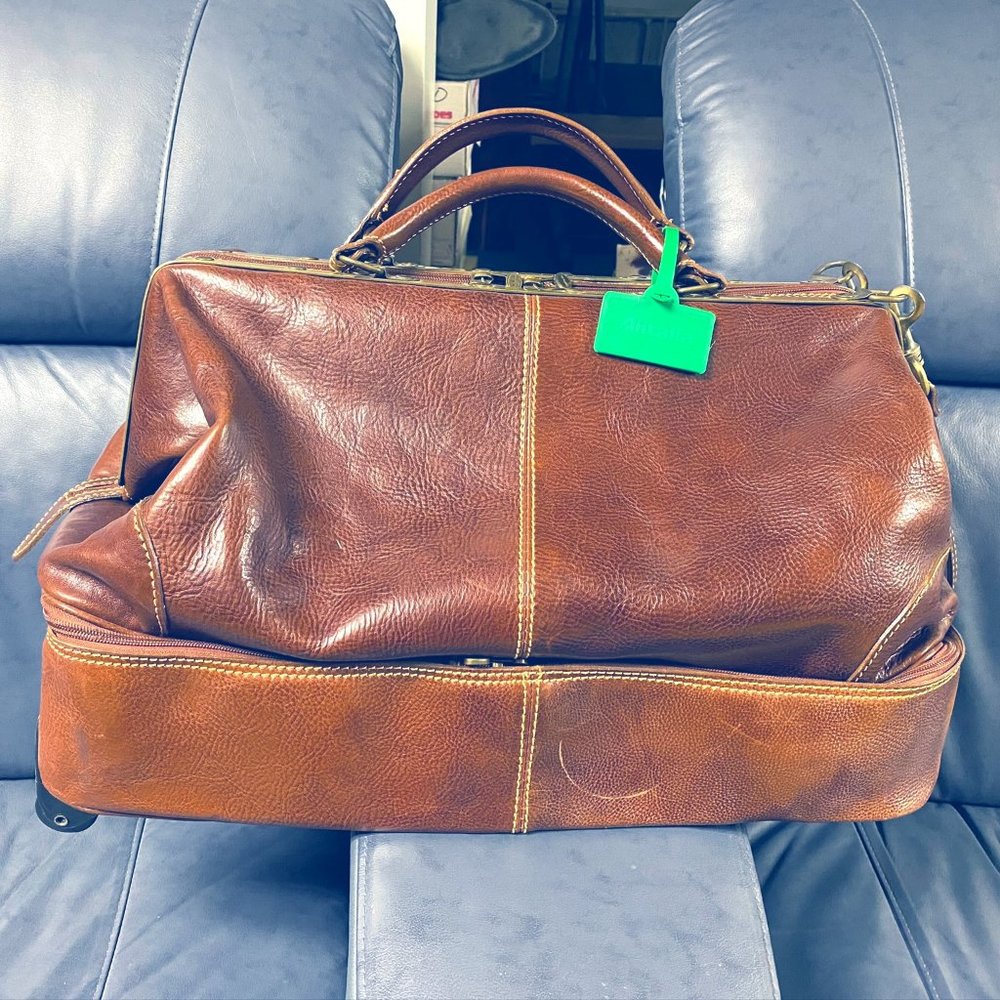 Italian leather 2 compartment wheeled duffel.